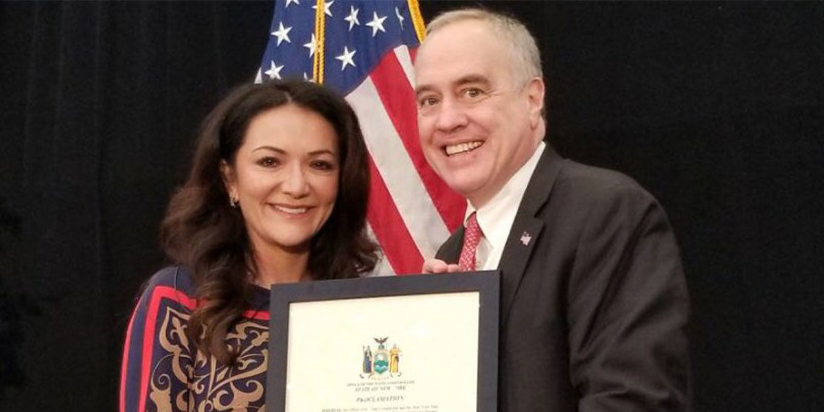 Nina Vaca receives proclamation from the State of New York